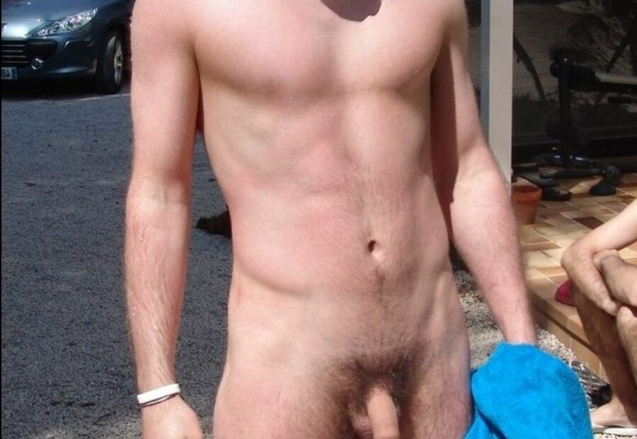 Flaccid nude boy outdoors
