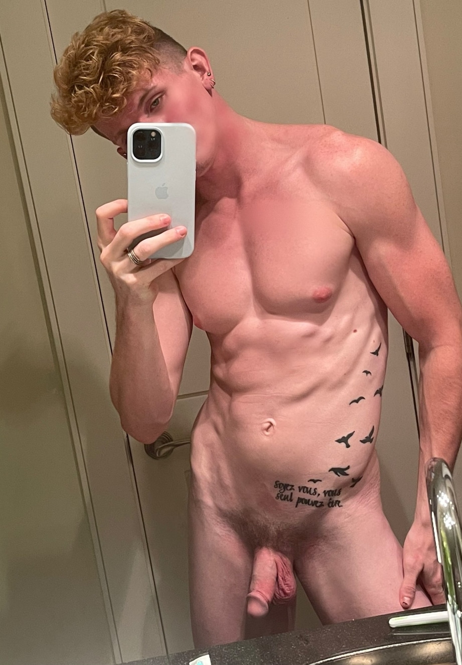 Muscle boy taking a selfie
